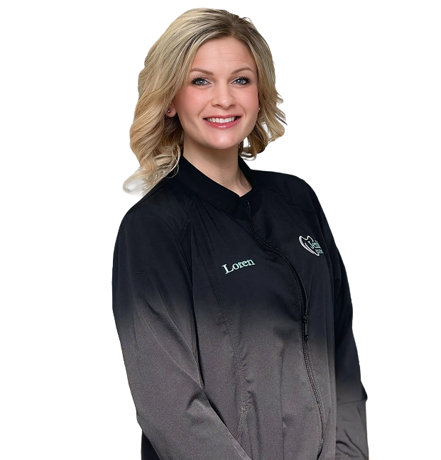 Smiling woman with blonde hair in black uniform against a black background. Her jacket has the name "Loren" embroidered on it. Professional and friendly tone.